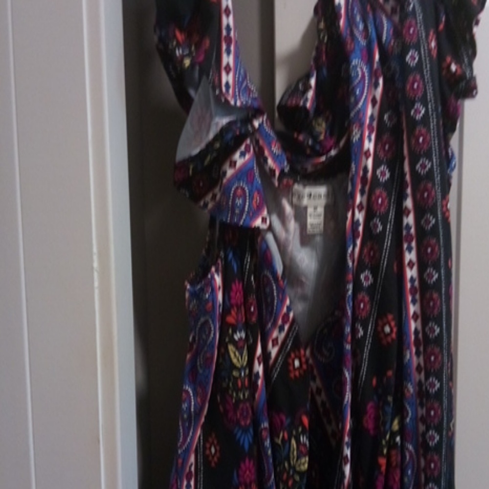 A floral black off-the-shoulder jumpsuit